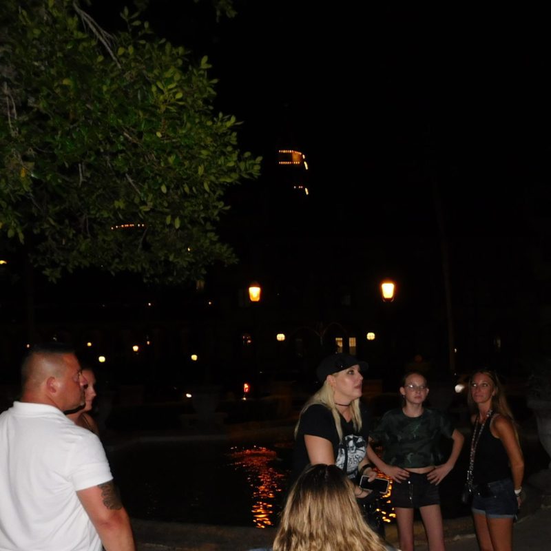 a group of people standing in front of a crowd