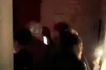 a man standing in front of a door