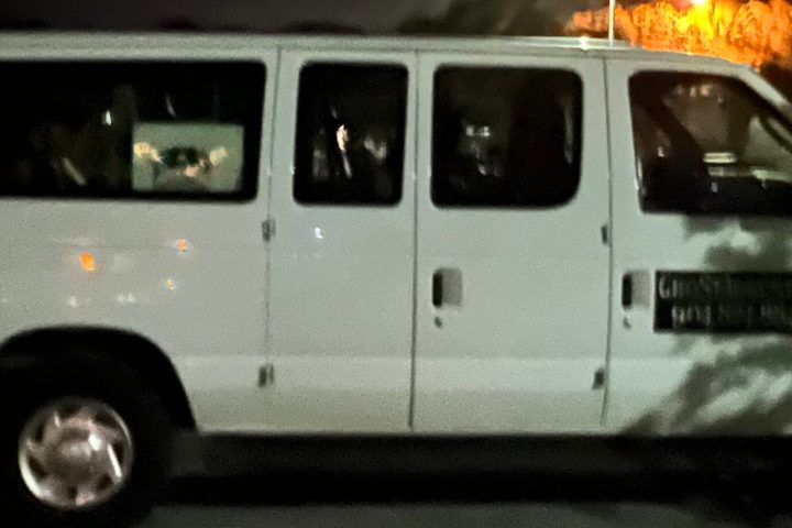 a van parked on the side of a road