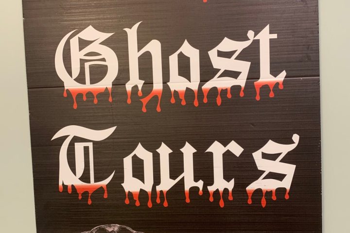 a close up of text on a black surface