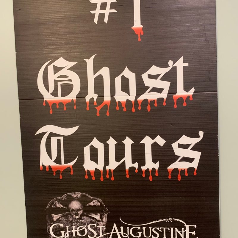 a close up of text on a black surface