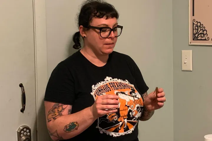 a man holding a guitar