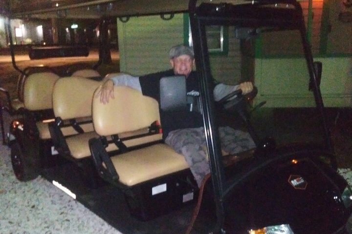 a group of people sitting at a train station