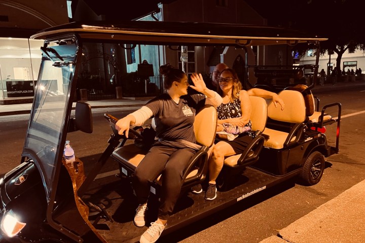 a person sitting on a motorcycle