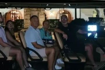 a group of people sitting at a table