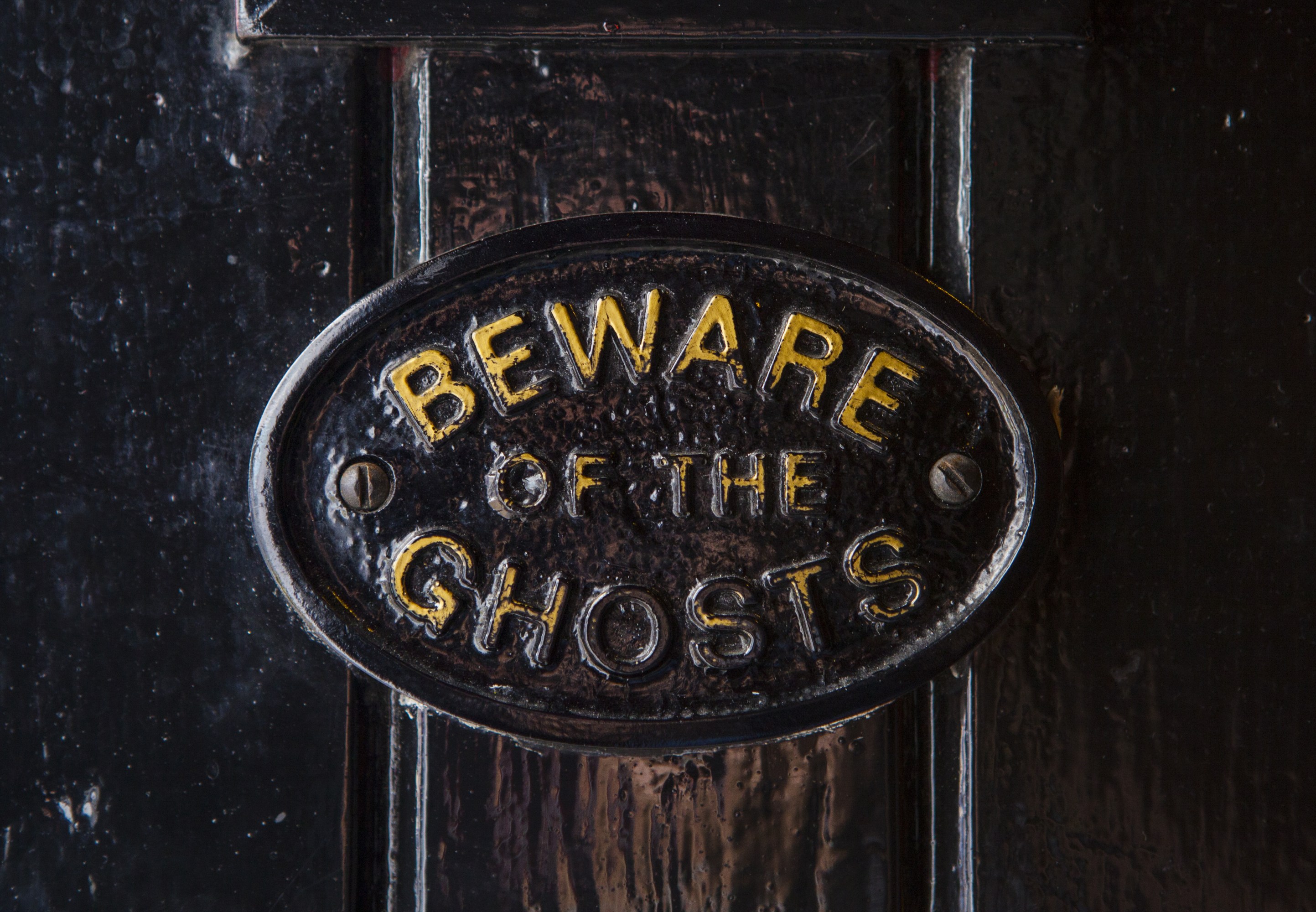 A,Beware,Of,The,Ghosts,Plaque,On,The,Entrance,To
