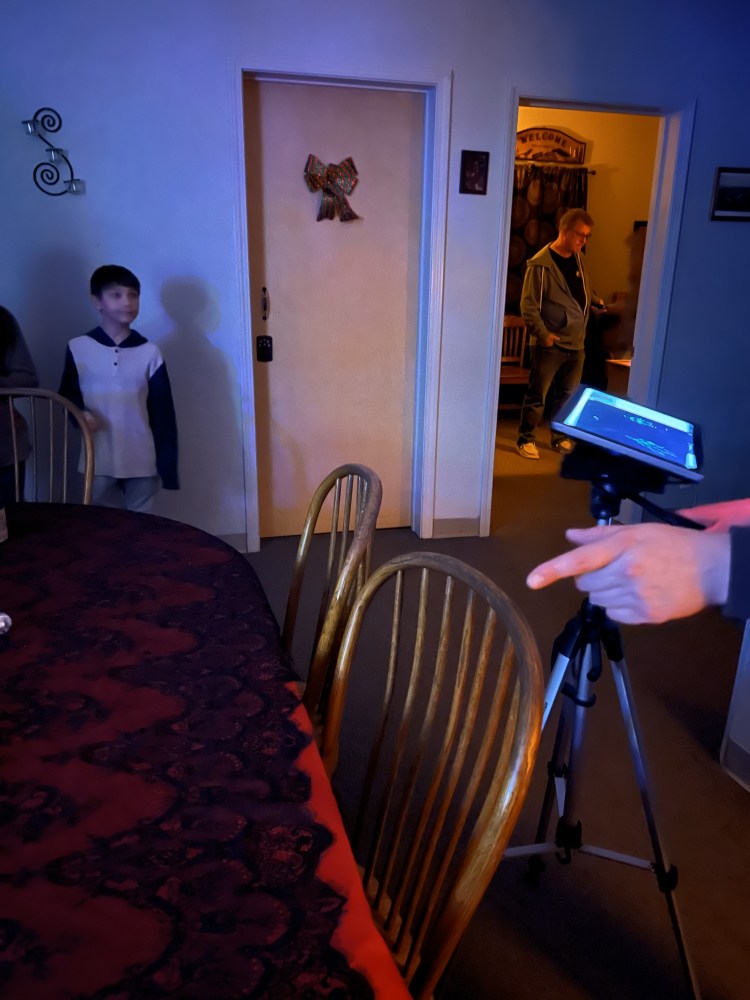 a person sitting on a chair in a room